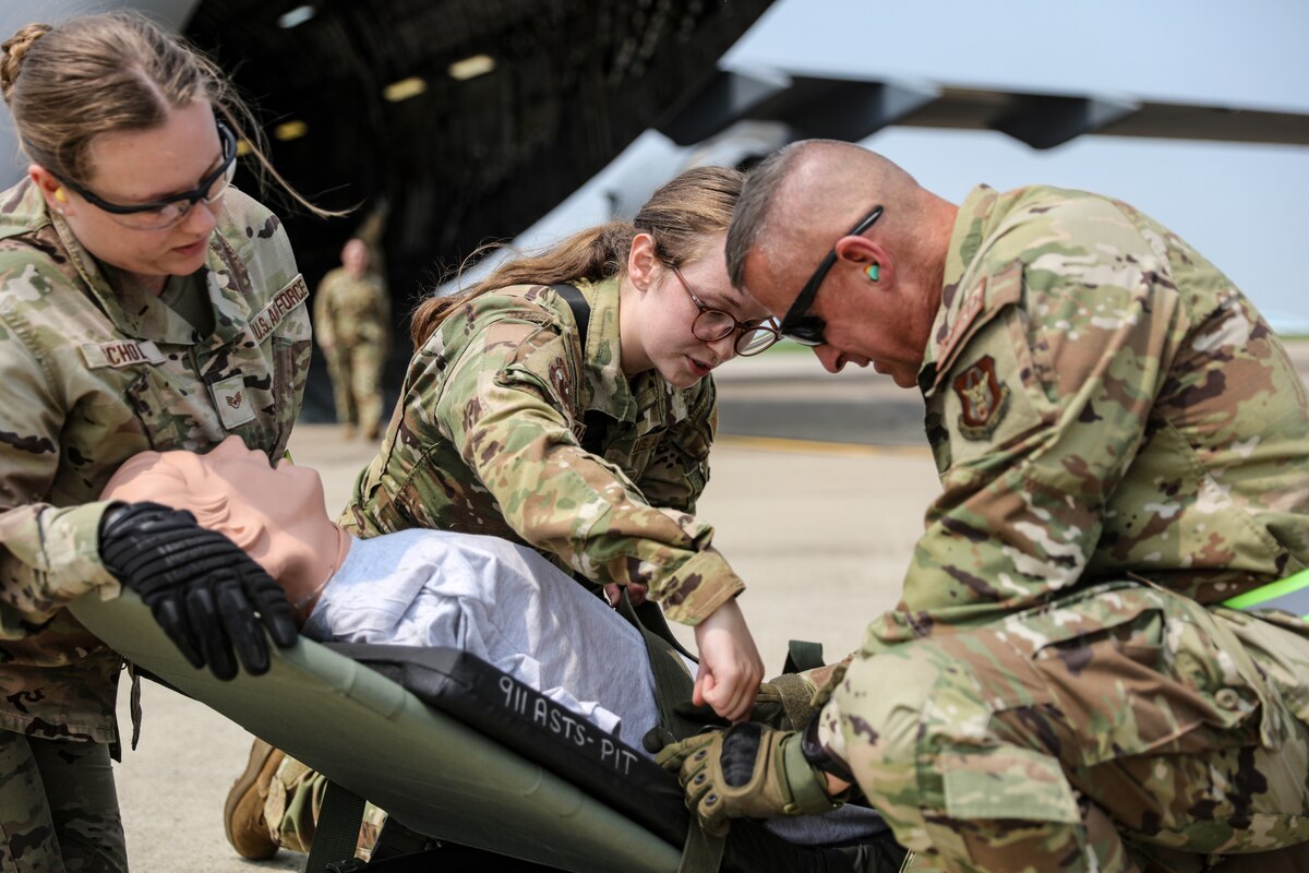 Image of Airmen training on aircraft.