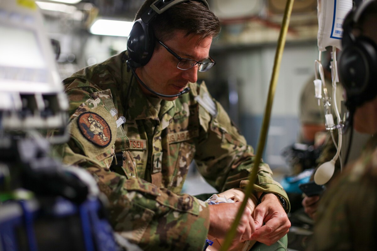 Image of Airmen training on aircraft.