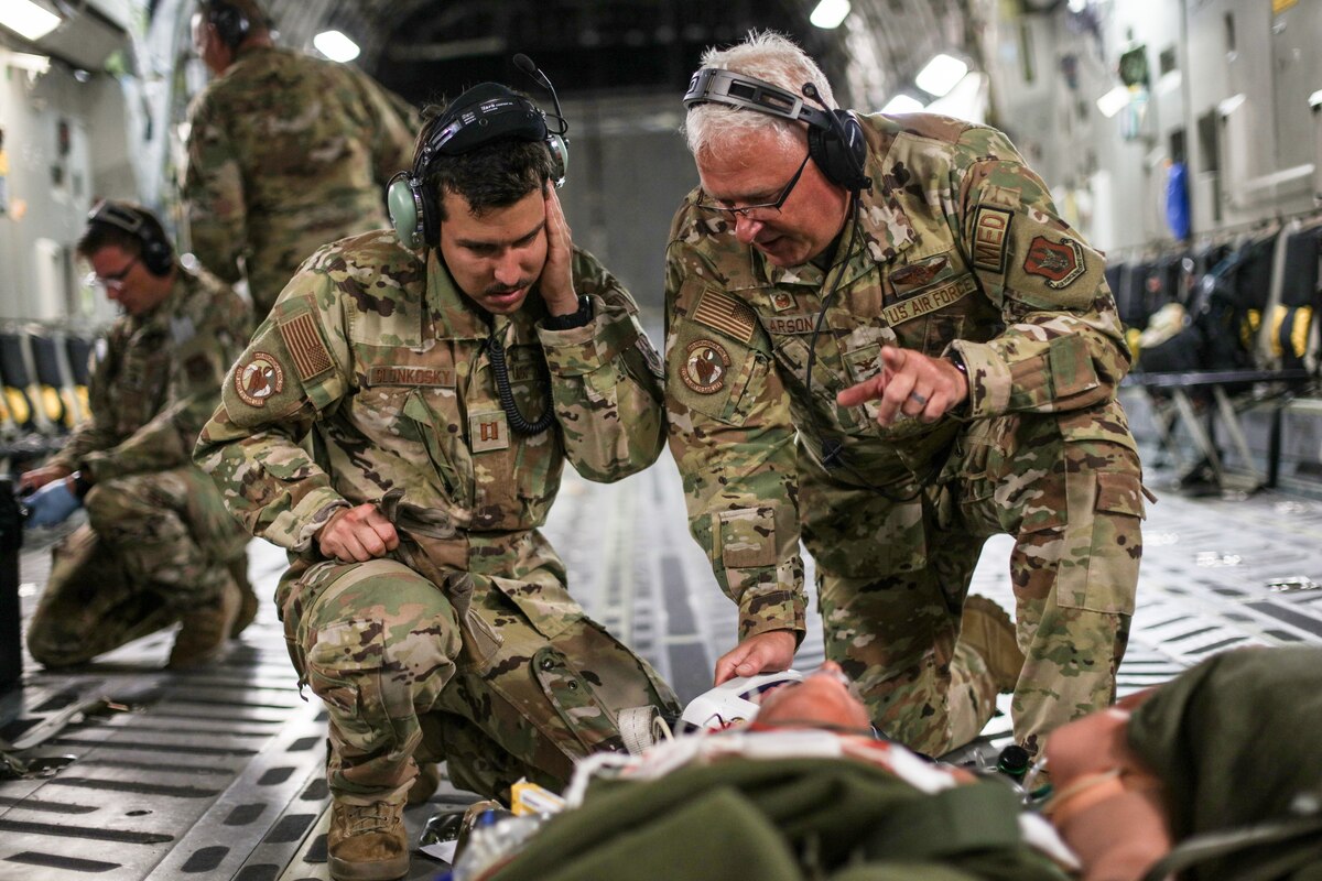 Image of Airmen training on aircraft.