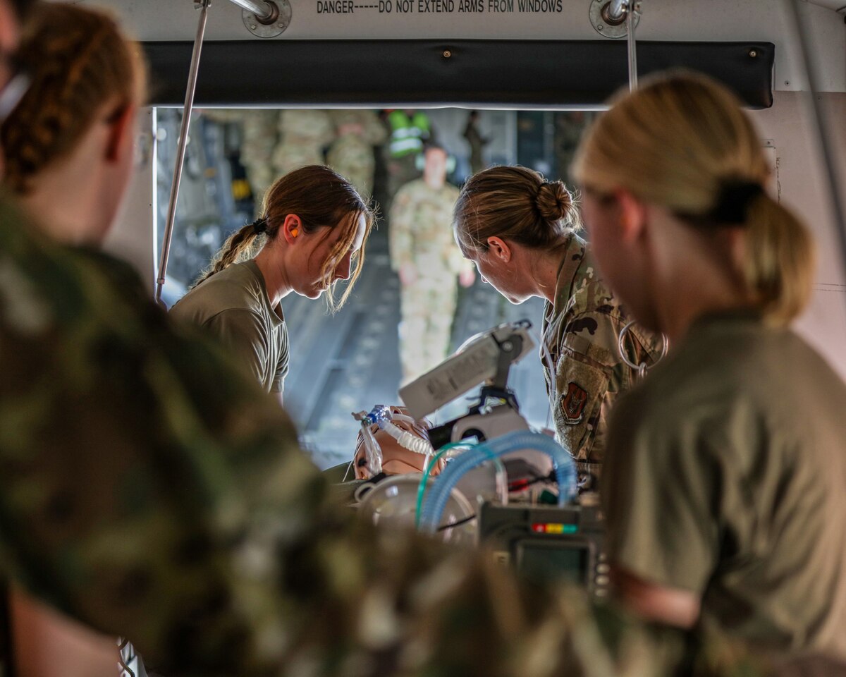 Image of Airmen training on aircraft.