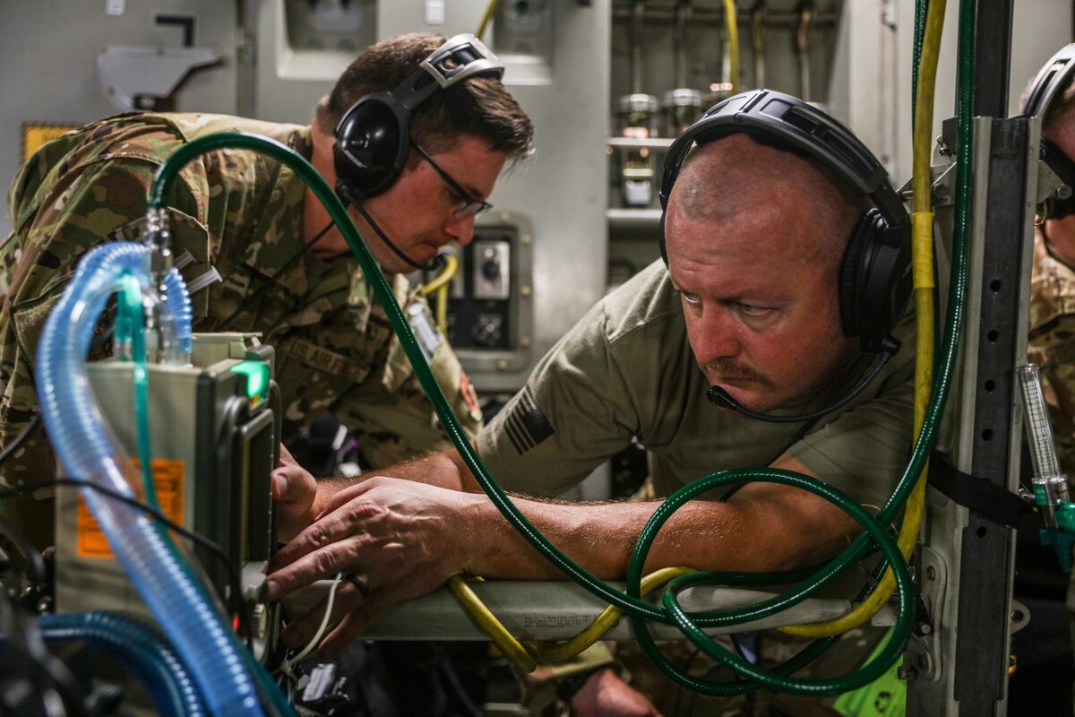 Image of Airmen training on aircraft.