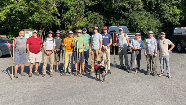 Upper Cumberland Southern Off-Road Bicycle Association volunteers pose Aug. 19, 2023, for a group photo at the Bear Wheels Mountain Bike Trailhead at Cordell Hull Lake in Carthage, Tennessee. (USACE Photo by Park Ranger Stone Fagan)