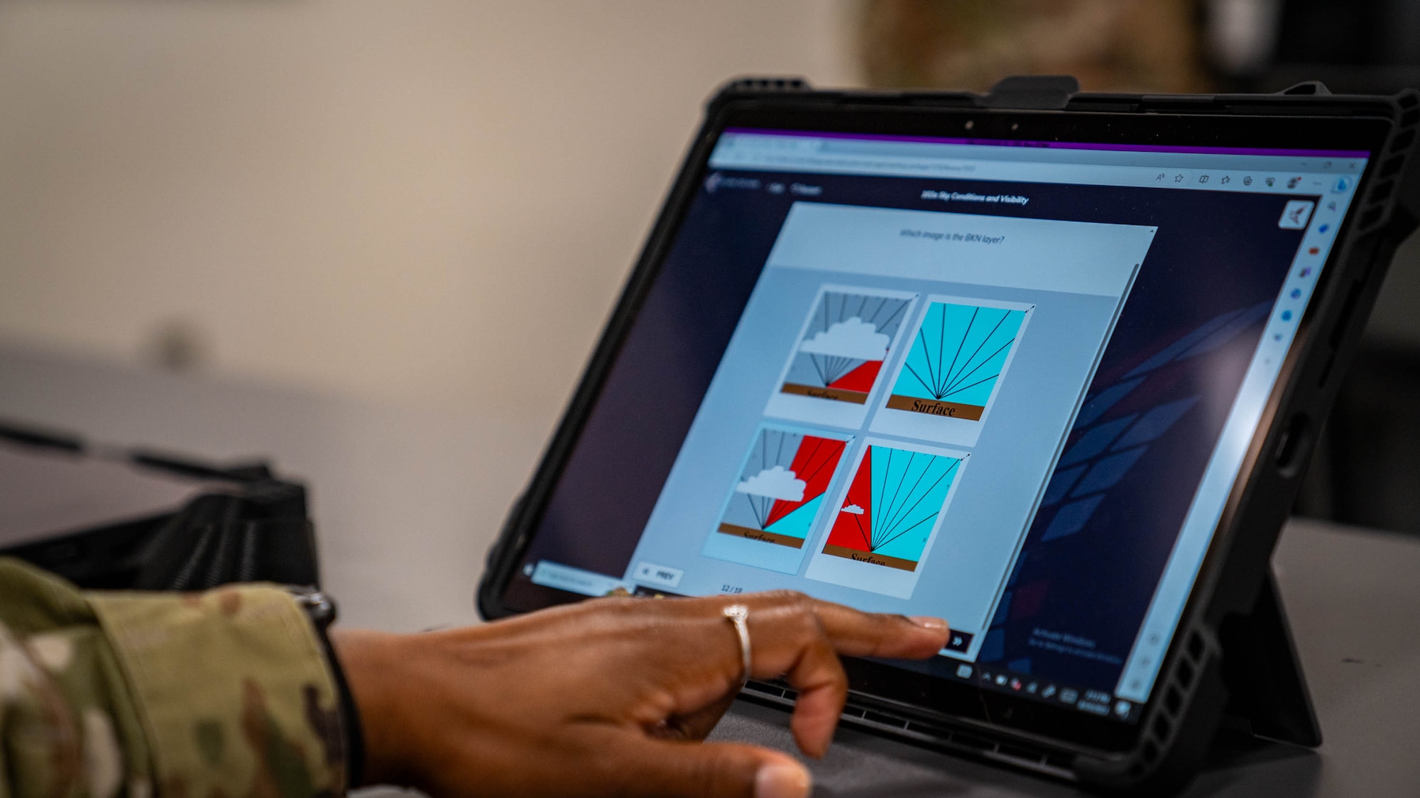 U.S. Air Force Airman 1st Class Hayleigh Ward, 335th Training Squadron weather forecast apprentice course student, utilizes a digital tablet during class at Keesler Air Force Base, Mississippi, Aug. 24, 2023.