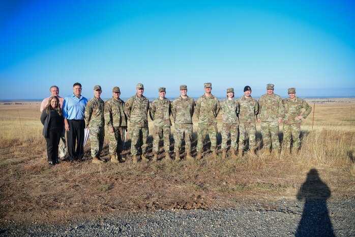 U.S. Air Force Maj. Gen. Thomas Hensley, 16th Air Force deputy commander, and 9th Reconnaissance Wing leaders pose for a group photo on Beale Air Force Base, California, Aug. 24, 2023.