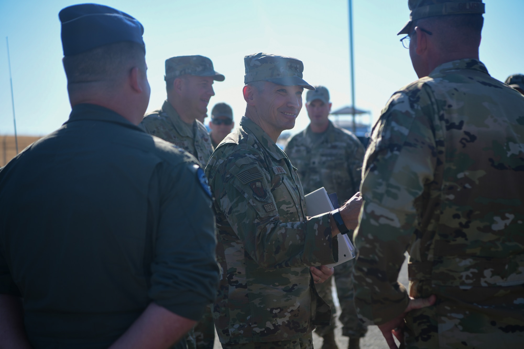 U.S. Air Force Maj. Gen. Thomas Hensley, 16th Air Force deputy commander, greets members from the 940th Air Refueling Wing on Beale Air Force Base, California, Aug. 24, 2023.