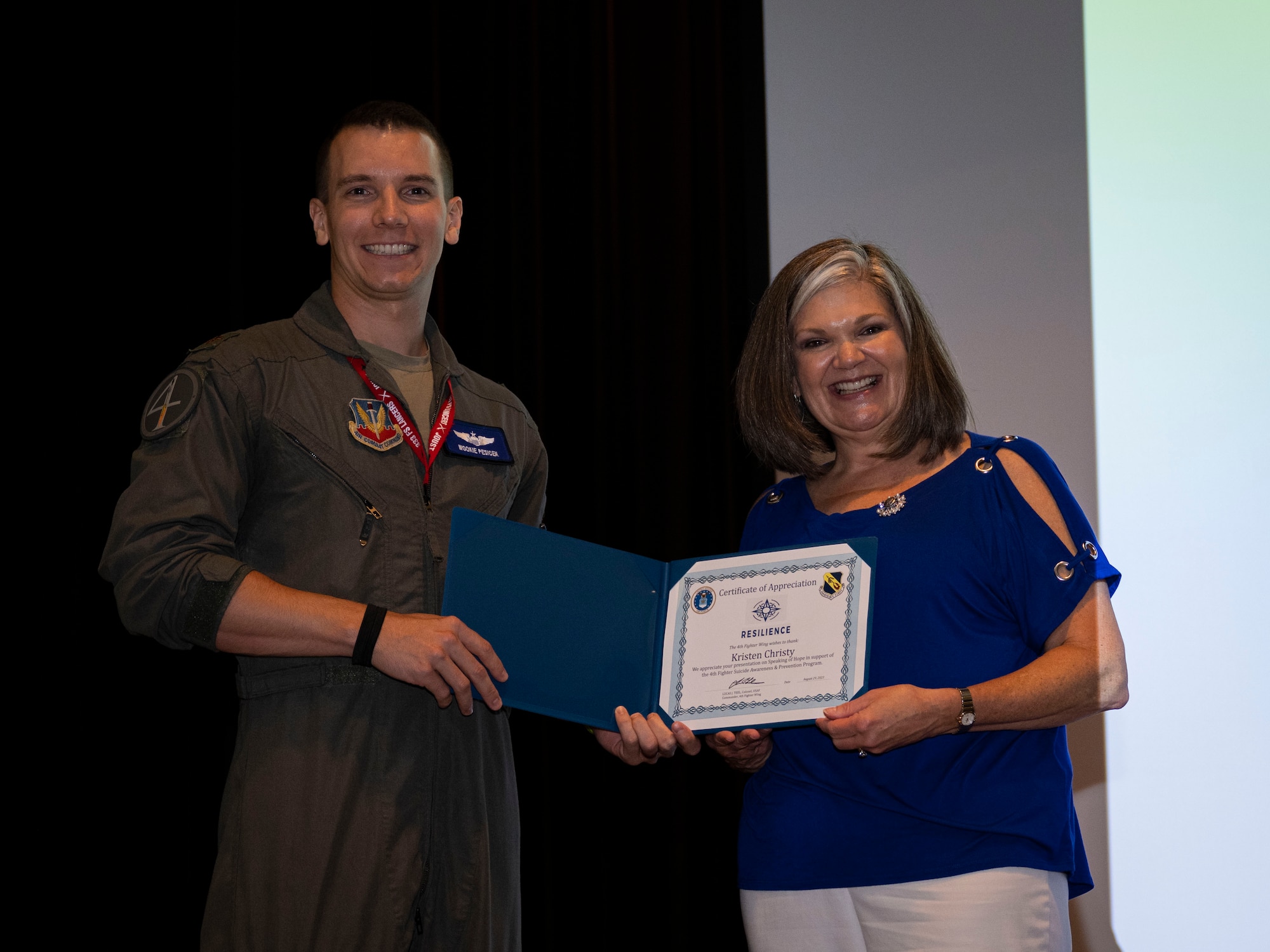 Kristen Christy, left, an international resilience expert, poses for a photo with an Airman assigned to the 4th Fighter Wing after conducting a resiliency chat at Seymour Johnson Air Force Base, North Carolina, Aug. 29, 2023. Christy came to Seymour Johnson AFB to talk with Airmen about resilience in preparation for National Suicide Prevention and Awareness month in September. (U.S. Air Force photo by Senior Airman David Lynn)