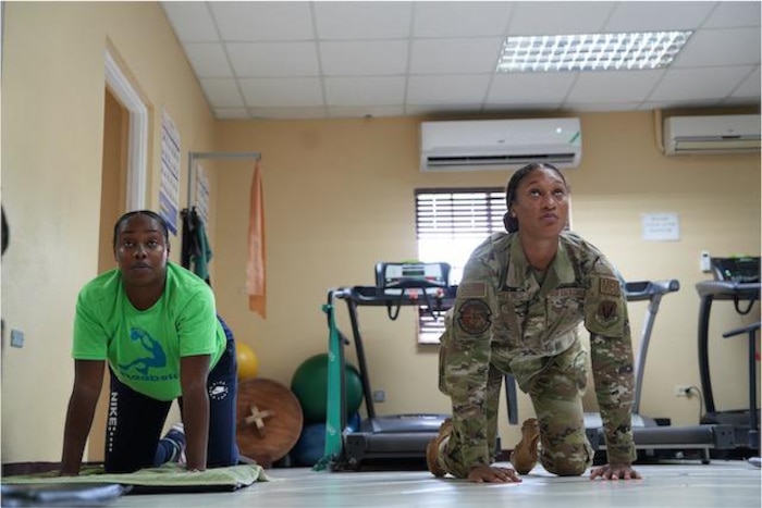 A 633rd Operational Medical Readiness Squadron at Langley Air Force Base, Va., demonstrates physical therapy techniques in Kingston.