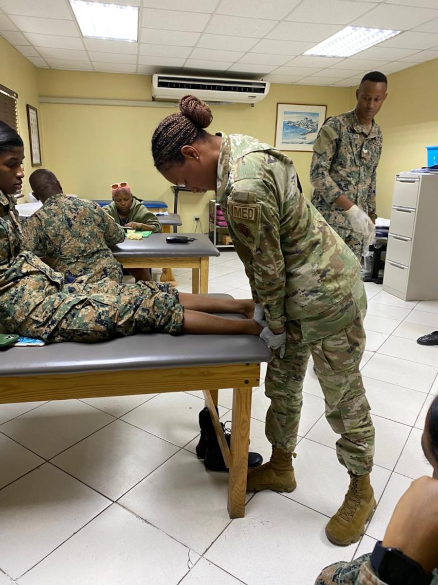 A collaborative healthcare visit at the Jamaica Defense Forces Medical Center.