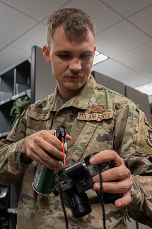 305th Operations Support Squadron aircrew flight equipment technician, converts legacy green night vision goggles to white phosphor NVGs for the KC-46A Pegasus at Joint Base McGuire-Dix-Lakehurst, N.J.