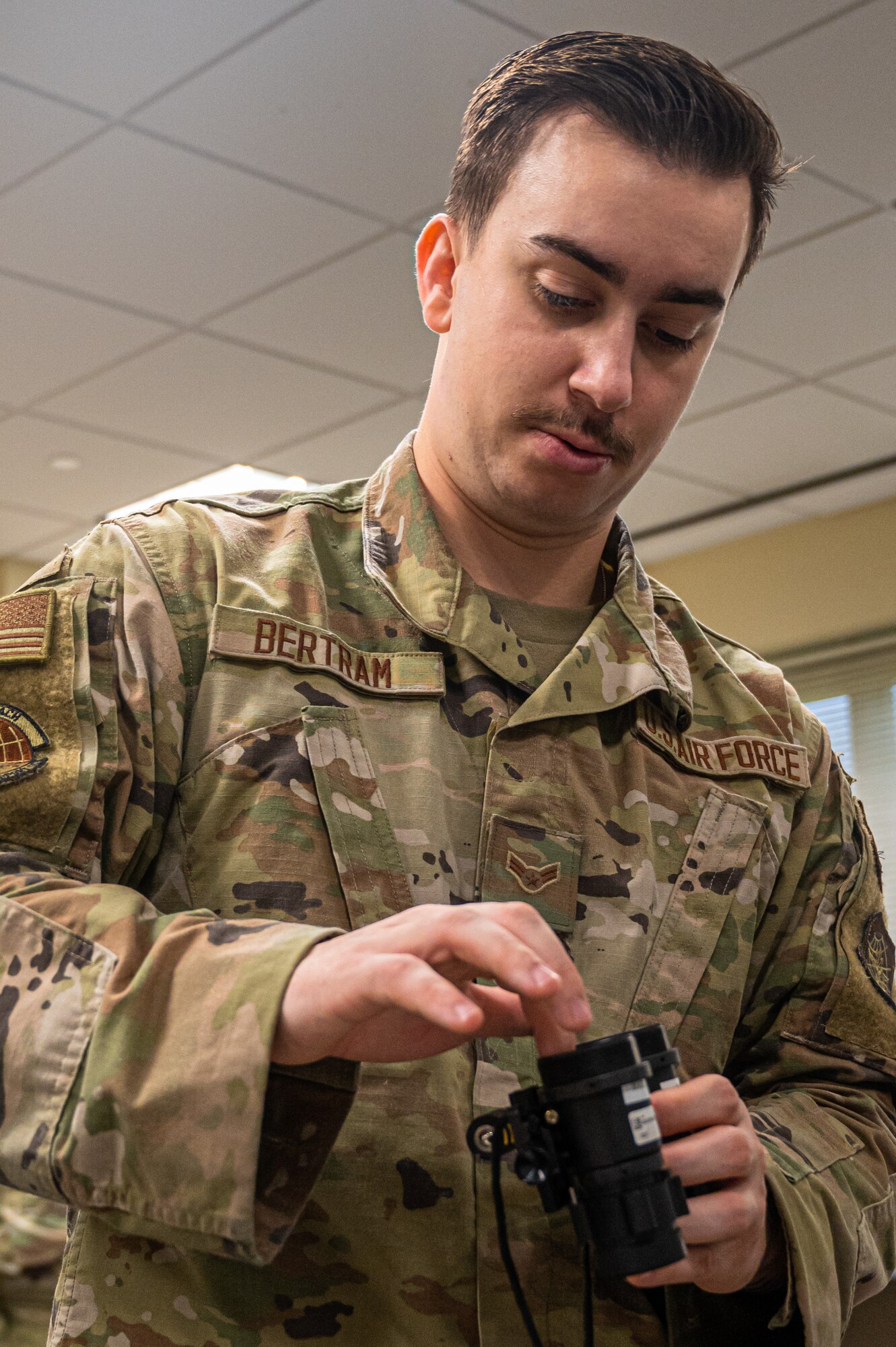 305th Operations Support Squadron aircrew flight equipment technician, converts legacy green night vision goggles to white phosphor NVGs for the KC-46A Pegasus at Joint Base McGuire-Dix-Lakehurst, N.J.
