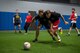 Team Minot Airmen contend for position on the ball at the 2023 Summer Games at Minot Air Force Base, North Dakota, Aug. 25, 2023. The annual Summer Games are put on by the 5th Force Support Squadron to promote physical health, camaraderie and competition. (U.S. Air Force photo by 2nd Lt Casen Salitore)