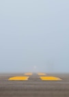 An area of the main parking area sits empty after a B52-H Stratofortress taxis away at Minot Air Force Base, North Dakota, Aug. 24, 2023. During extreme foggy conditions the airfield is brightly illuminated to ensure the safety of all jets and personnel. (U.S. Air Force photo by Airman 1st Class Alexander Nottingham)