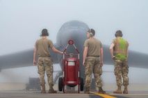 A group of crew chiefs do a final communications check before preparing the B52-H stratofortress for take off at Minot Air Force Base, North Dakota, Aug. 24, 2023. These experts ensure that the aircraft in their care are ready to fly at a moment’s notice so that pilots can safely and effectively complete their mission. (U.S. Air Force photo by Airman 1st Class Alexander Nottingham)