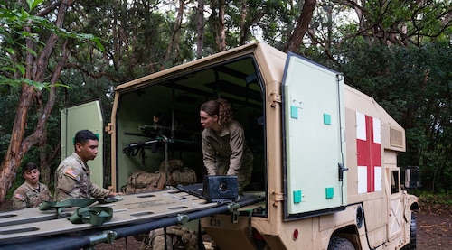 U.S. Air Force Staff Sgt. Aubrey Rowe, 15th Wing Independent Duty Medical Technician, works with U.S. Army medics during the Ranger Assessment Course to ensure the Airmen, Guardian, and Soldiers are taken care of while they navigate through the obstacle course, May 29, 2023. While navigating their way through the RAC, the Airmen, Guardian, and Soldiers were looked after by a team of joint force medics—further displaying how integrated the Air Force is with its Army counterparts. (U.S. Air Force photo by Tech. Sgt. Hailey Haux)