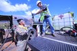 Spc. Abraham Arreortua, petroleum supply specialist, from 25th Infantry Division, deploys a fuel line at the forward fuel supply point on Maui, Aug. 23. The 25th ID Soldiers are using a Heavy Expandable Mobile Tactical Truck at a forward fuel point to optimize refueling efficiency for USACE contractors who pick up and deliver fuel to 20 Federal Emergency Management Agency generators installed at critical facilities that lost power following the wildfires Aug. 8.