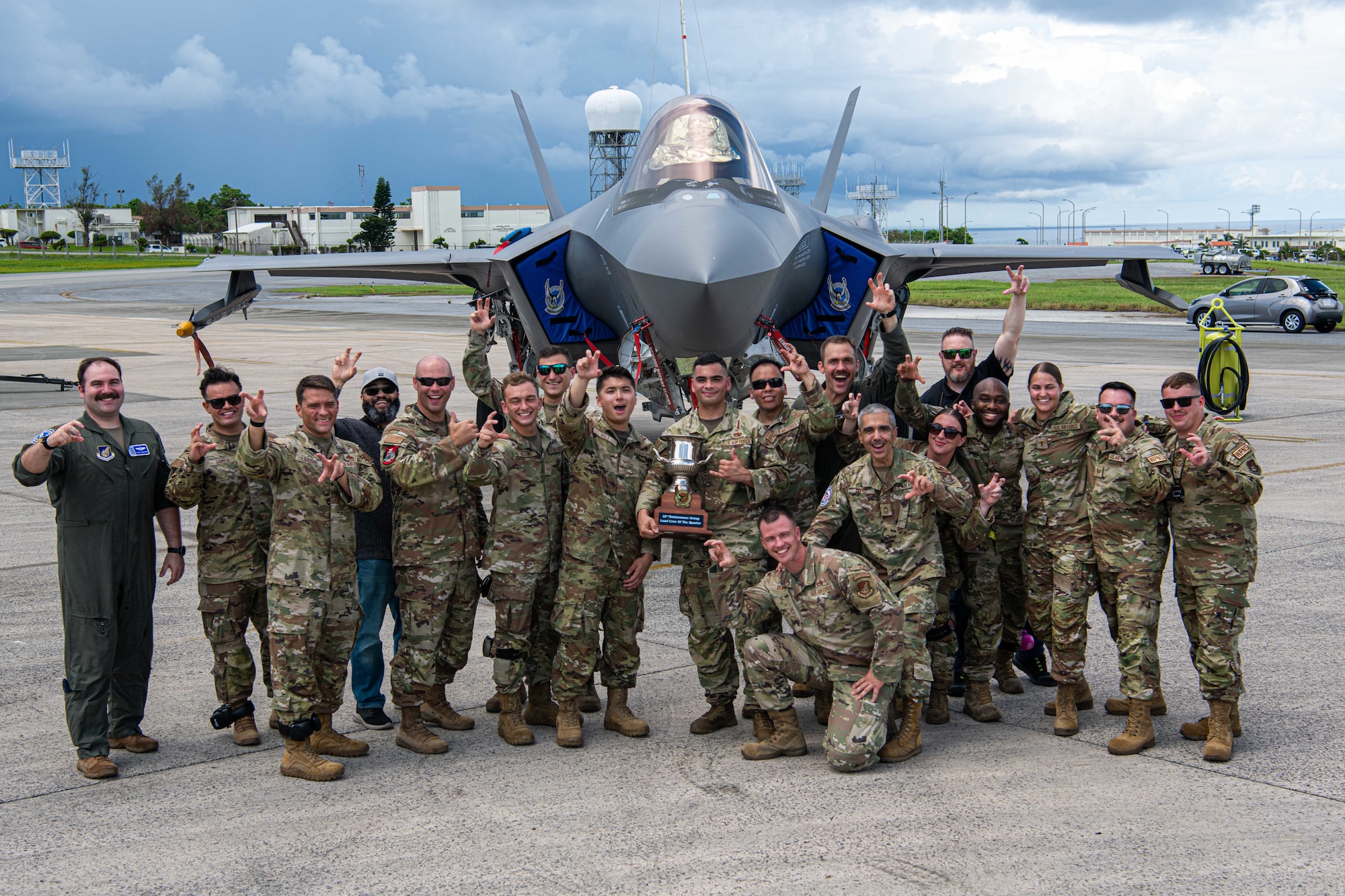 Airmen celebrate their victory after a weapons load competition.