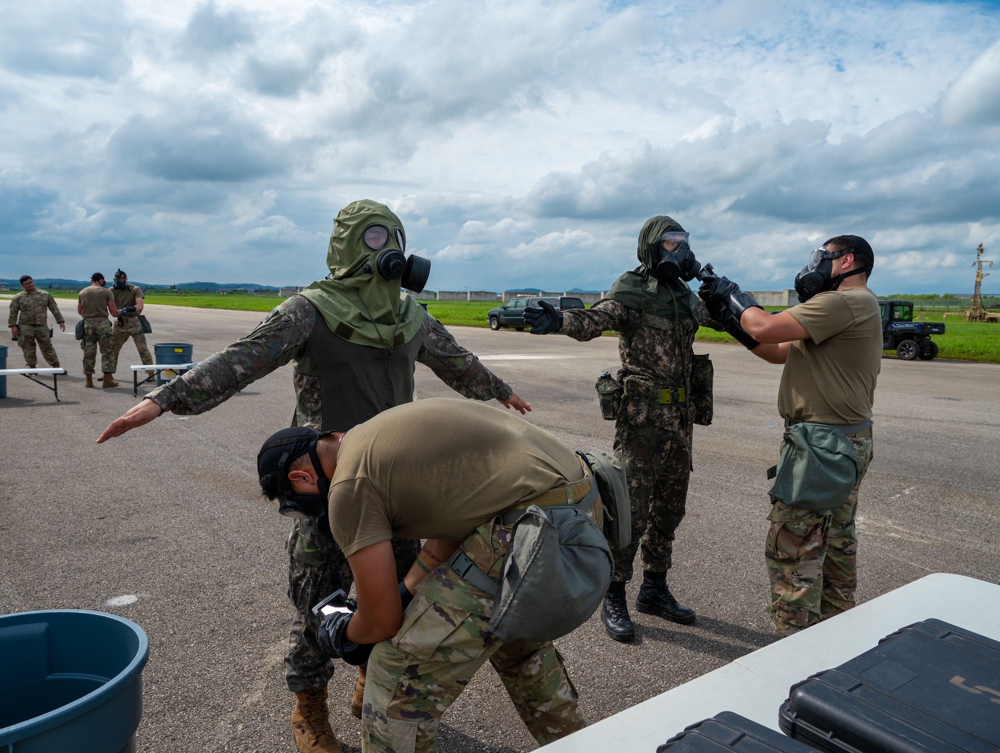 U.S. Air Force members perform a chemical, biological, radiological and nuclear detection test for Republic of Korea Air Force members during a combined forces training at Osan Air Base, ROK, Aug. 24, 2023.