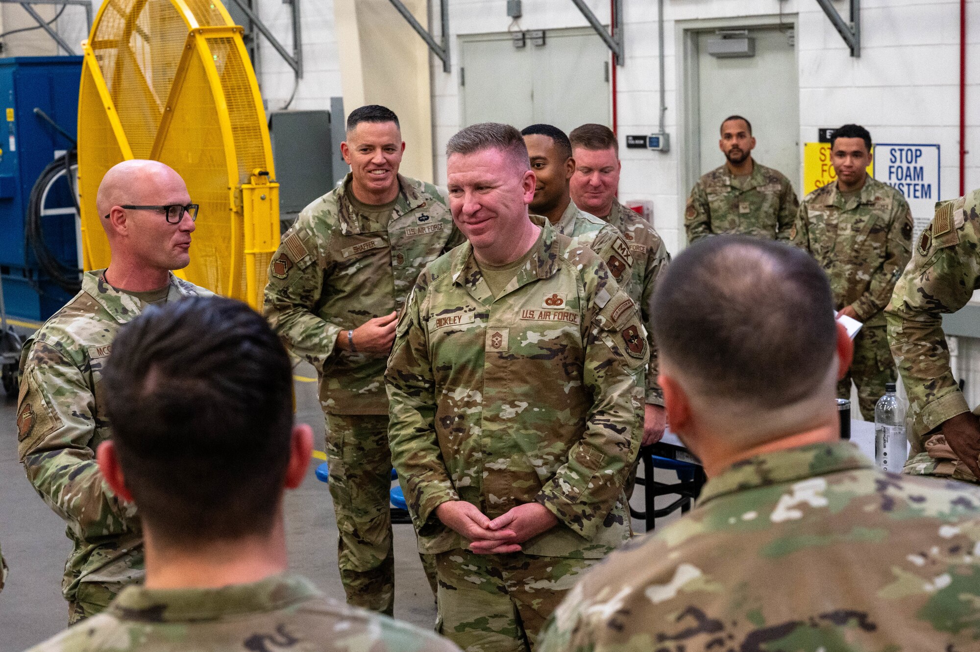 U.S. Air Force Chief Master Sgt. Chad Bickley, command chief of Air Education and Training Command, engages with 62nd Aircraft Maintenance Unit Airmen, Aug. 17, 2023, at Luke Air Force Base, Arizona.