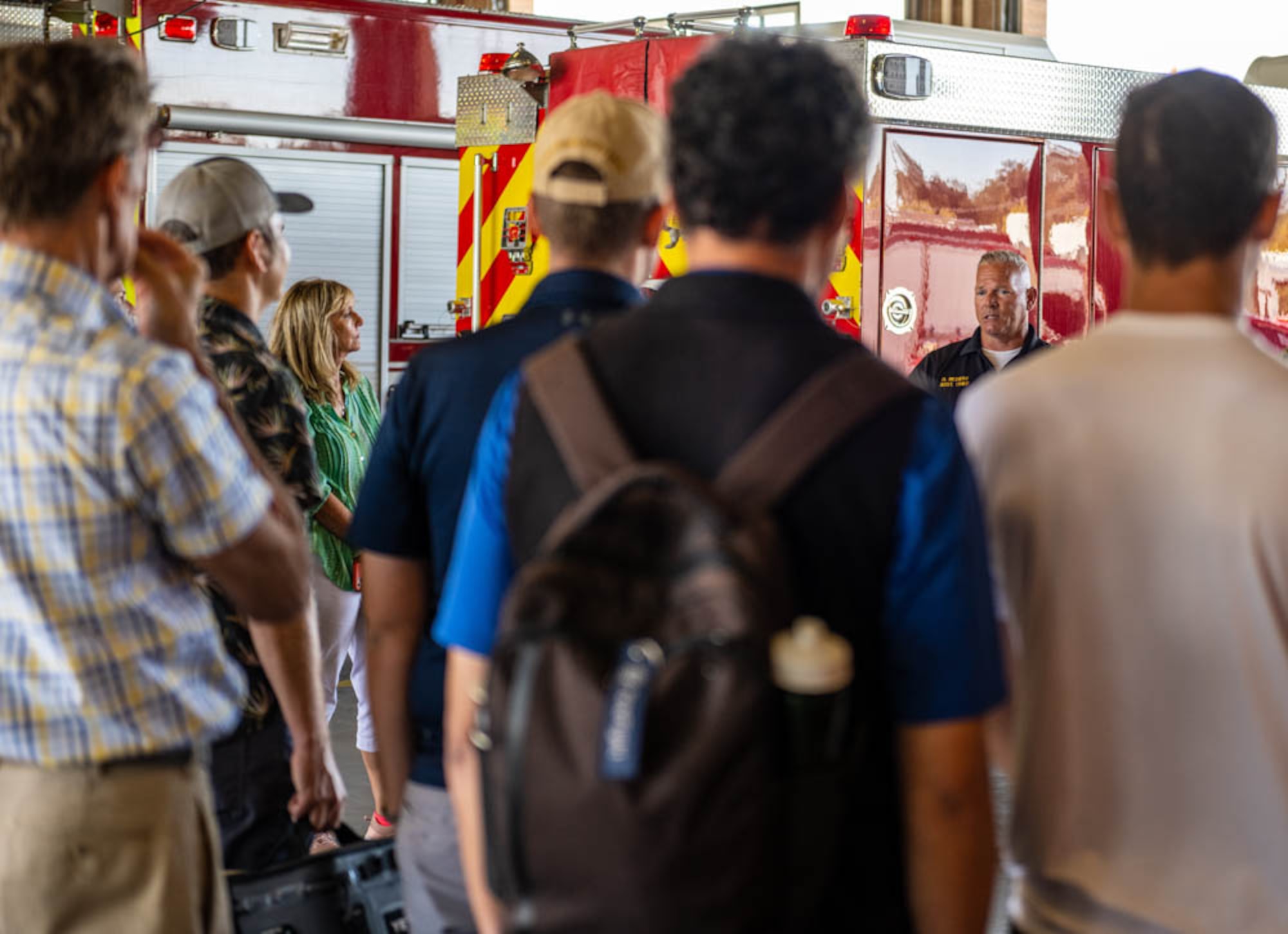 assistant fire chief talks to crowd