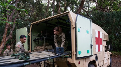 U.S. Air Force Staff Sgt. Aubrey Rowe, 15th Wing Independent Duty Medical Technician, works with U.S. Army medics during the Ranger Assessment Course to ensure the Airmen, Guardian, and Soldiers are taken care of while they navigate through the obstacle course, May 29, 2023. While navigating their way through the RAC, the Airmen, Guardian, and Soldiers were looked after by a team of joint force medics—further displaying how integrated the Air Force is with its Army counterparts. (U.S. Air Force photo by Tech. Sgt. Hailey Haux)