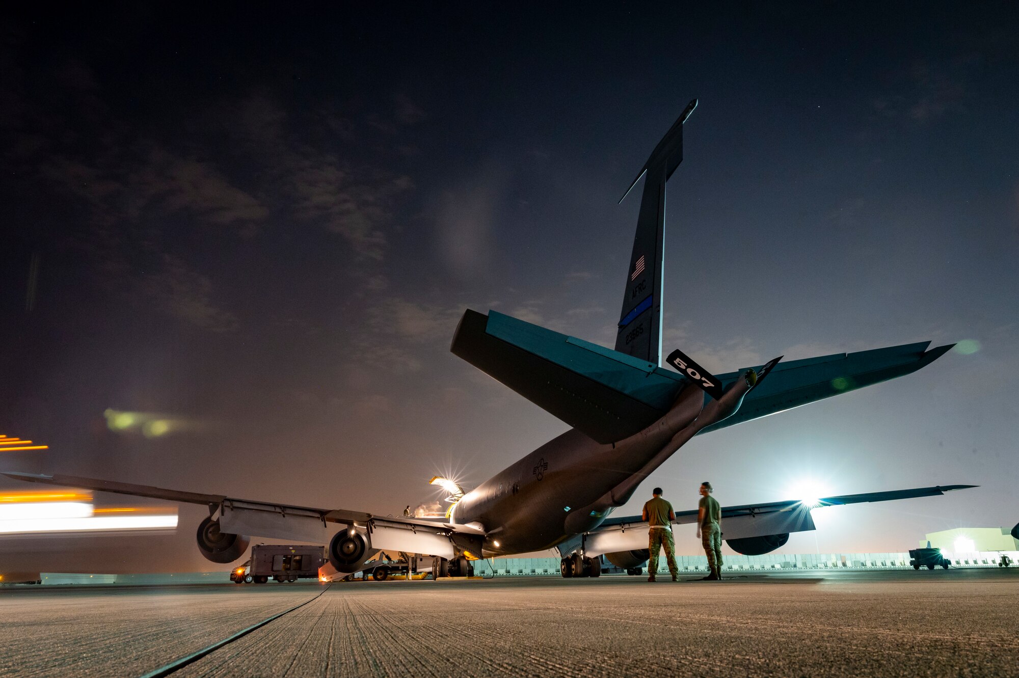 Aircraft on a flight line at night