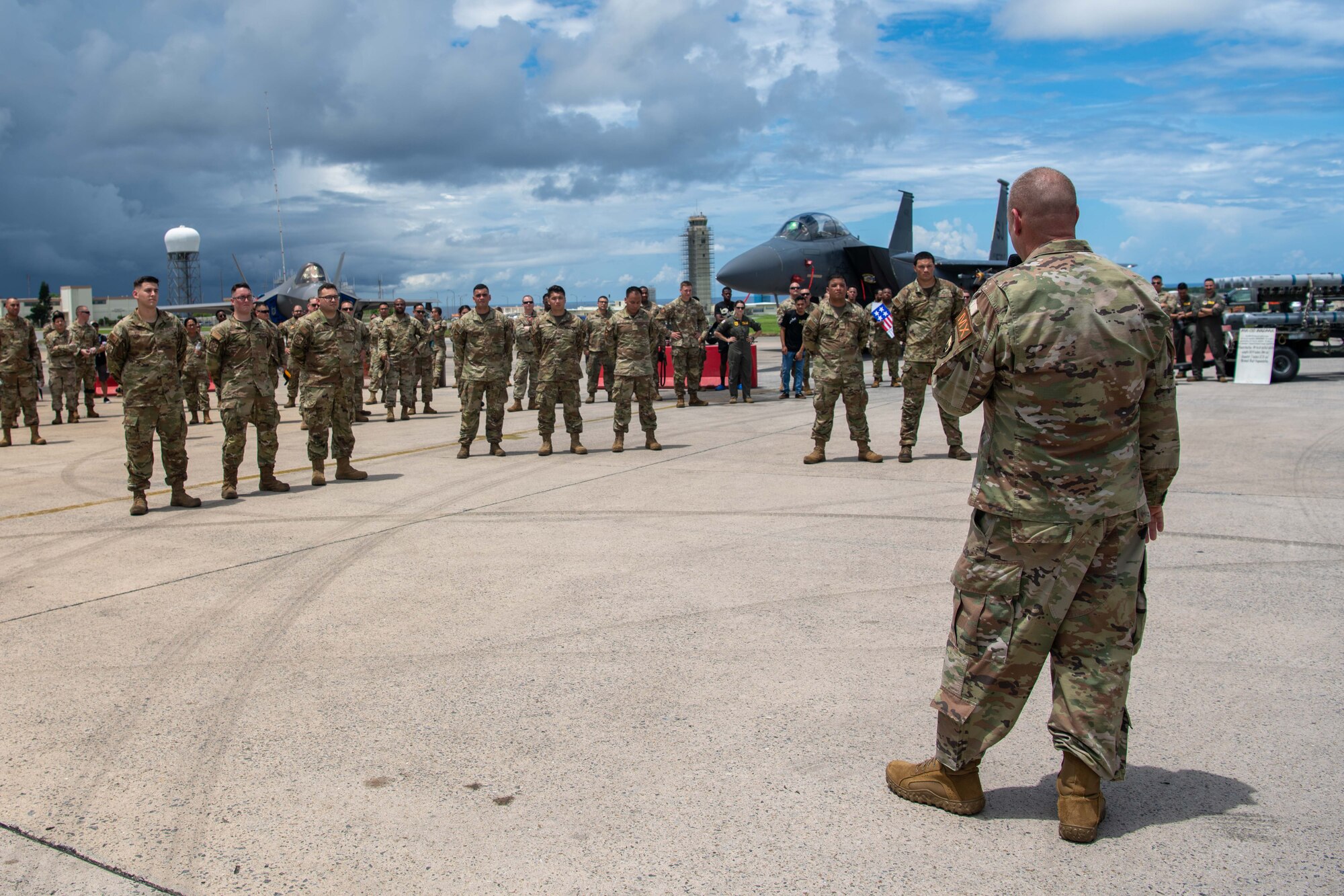 Commander speaks to the competing teams after the 18th Maintenance Group quarterly weapons load competition.