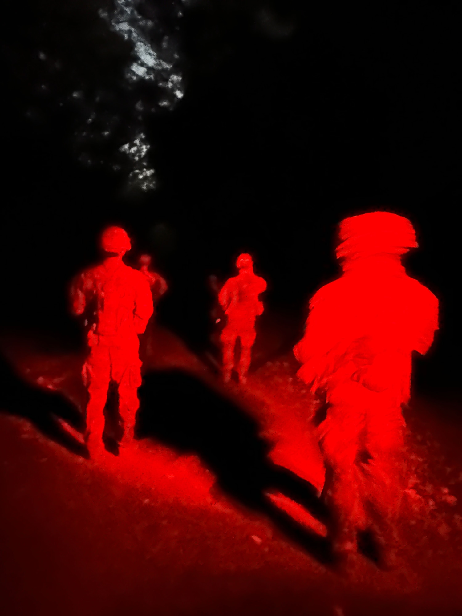 Ranger Assessment Course students conducting a battle drill at night to familiarize themselves with operating in limited visibility conditions, June 1, 2023, Schofield Barracks, Hawaii. During the course the Airmen, Soldiers and Guardian worked together, further reinforcing the need to understand what it’s like to work in a joint environment and in turn how to better support one another once they return to their respective units. (U.S. Air Force photo by Tech. Sgt. Hailey Haux)