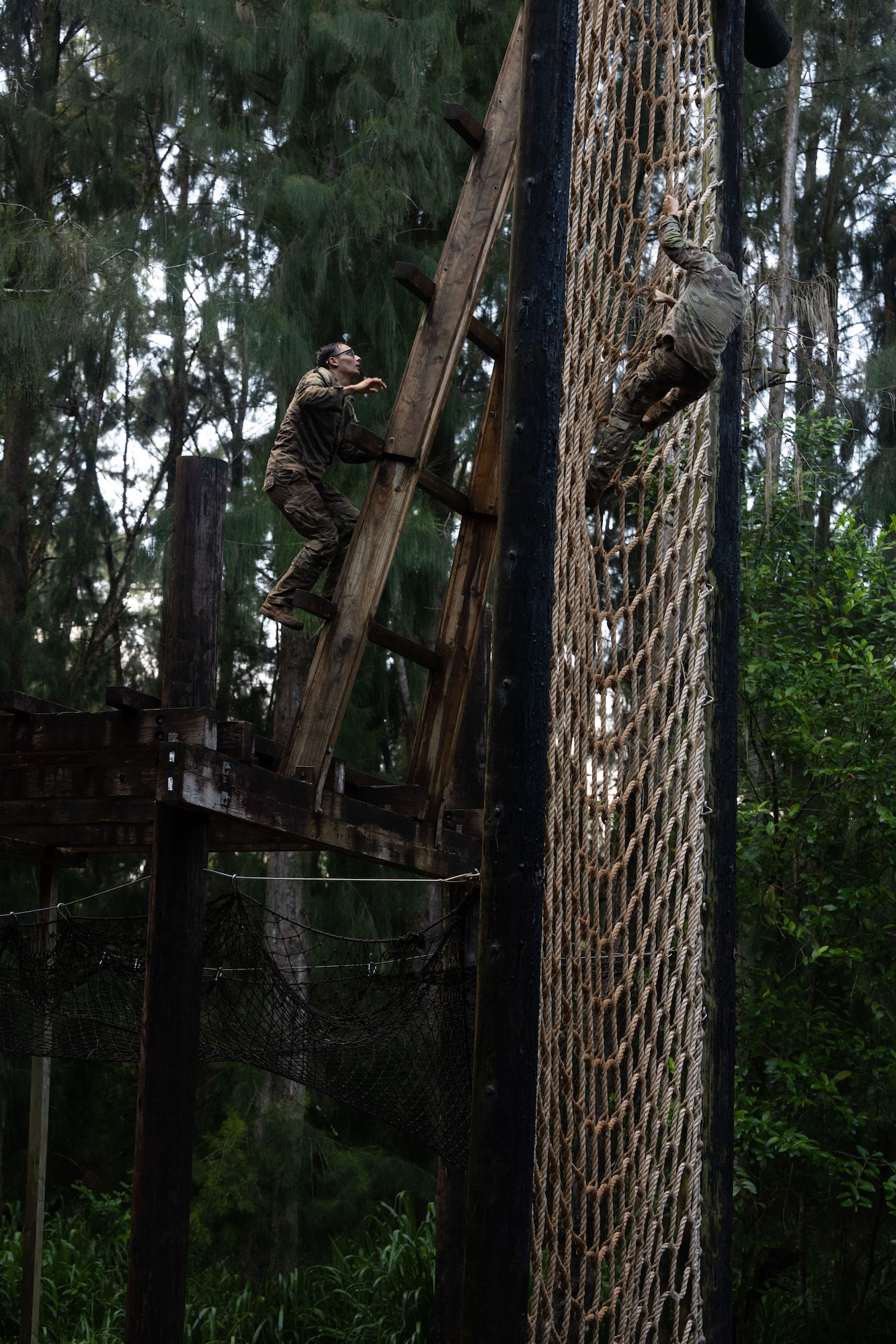 Ranger Assessment Course students go through the obstacle course, May 29, 2023, Schofield Barracks, Hawaii. While going through the RAC, students not only learned about the technical tactics, but they also conducted physical training and ruck marches to prepare them for the requirements at Ranger School. (U.S. Air Force photo by Tech. Sgt. Hailey Haux)