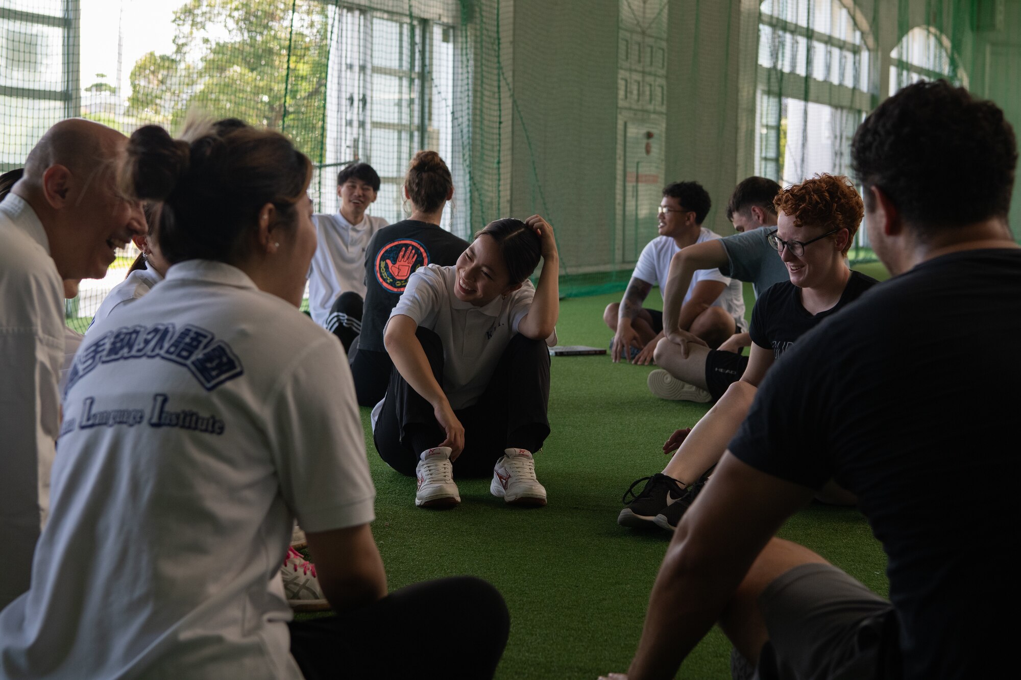 Volunteers and local students practice English.