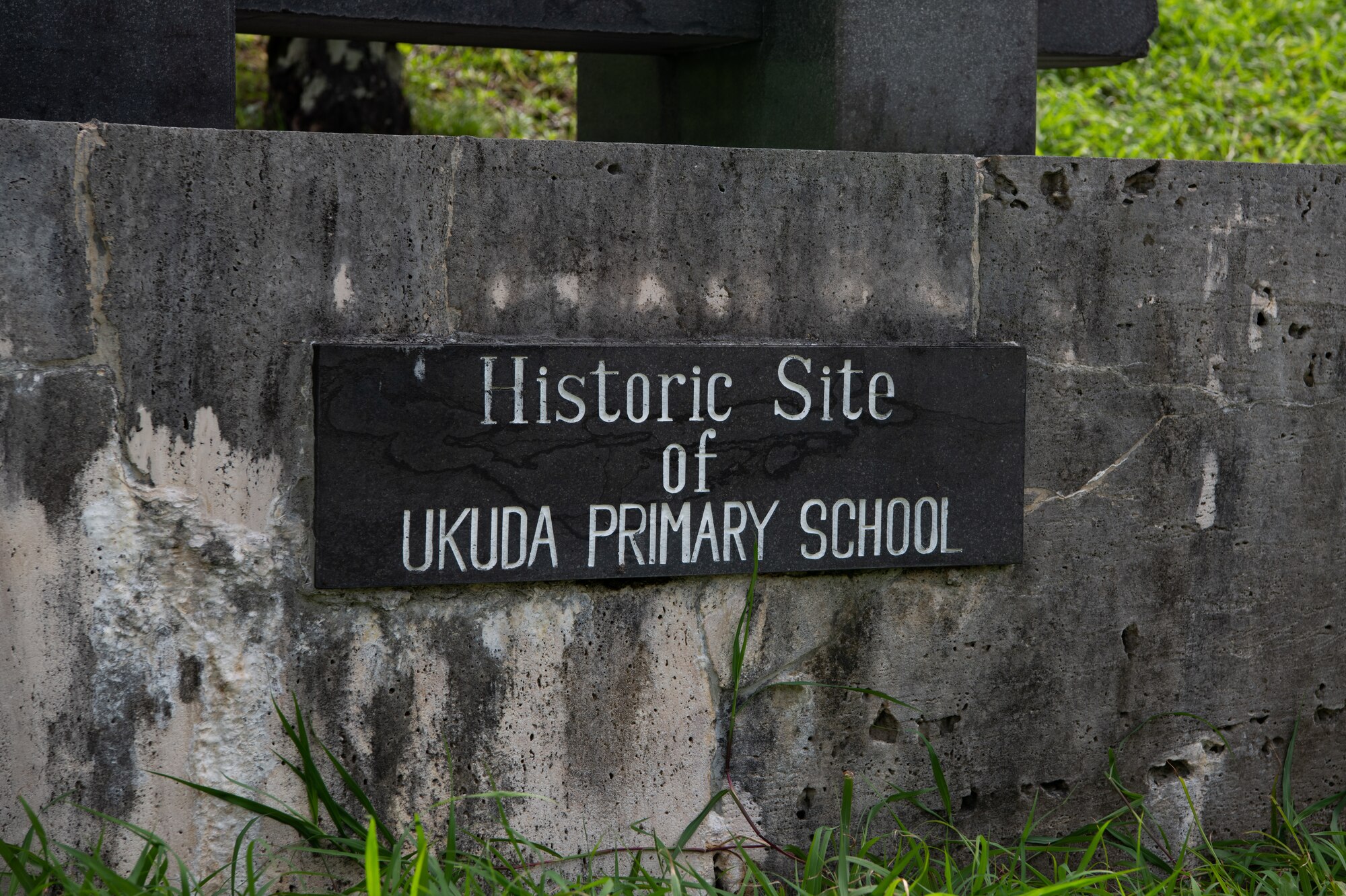 A plaque marks a historic site.