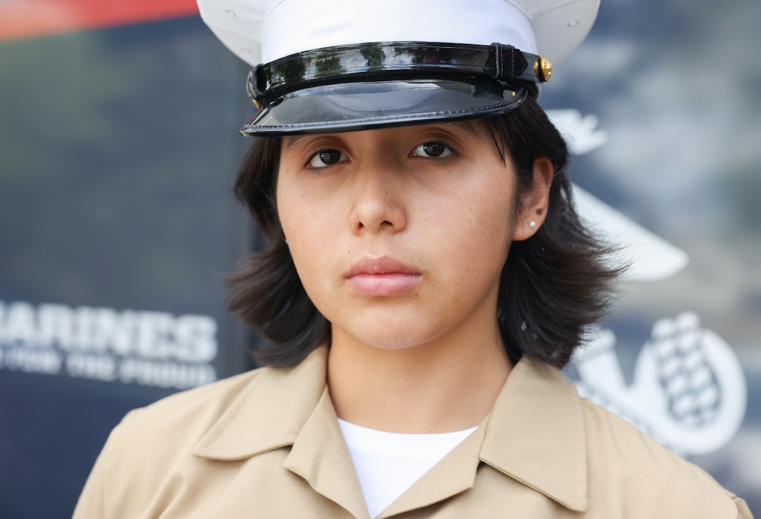 U.S. Marine Corps Pvt. Daniela Portillo, a recruiter assistant under the Command Recruiting Program with Recruiting Substation Murfreesboro, Recruiting Station (RS) Nashville, represents her RS in Nashville, Tennessee, August 7, 2023. This program offers new Marines the opportunity to return to their recruiting station in support of recruiting efforts. (U.S. Marine Corps photo by Cpl. Bernadette Pacheco)