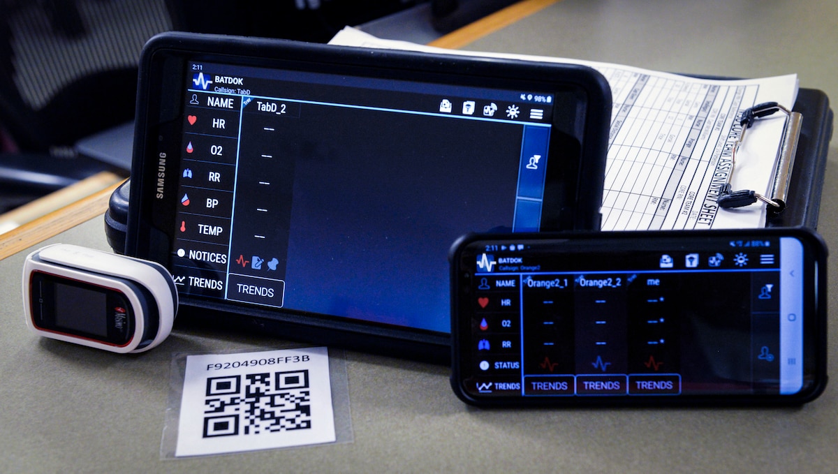 Various interfaces, sensors and codes that enable the Battlefield Assisted Trauma Distributed Observation Kit, or BATDOK, are displayed at Wright-Patterson Air Force Base, Ohio, April 28, 2020. BATDOK, a mobile medical documentation tool developed by Air Force Research Laboratory researchers, was recently selected as the joint integrated electronic health record for point-of-injury and en route care by Joint Operational Medicine Information Systems, an office that provides medical information technology for military operations. (U.S. Air Force photo / Wesley Farnsworth)