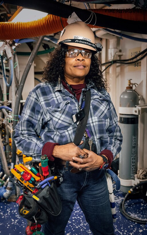 Jane Pollgreen 
Electrician, Shop 99, Temporary Services 
“I get the feeling of pride from the work I do and the unity with my teammates. I don't see it as work because this is what I love doing and the career that I enjoy.” (U.S Navy Photo by Wendy Hallmark)