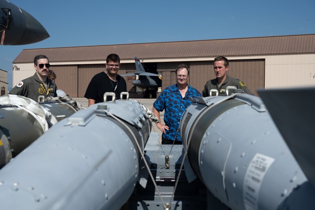 Two B-1B Lancer aviators assigned to the 37th Bomb Squadron conduct a tour of the B-1B and munitions at Ellsworth Air Force Base, South Dakota, July 21, 2023.