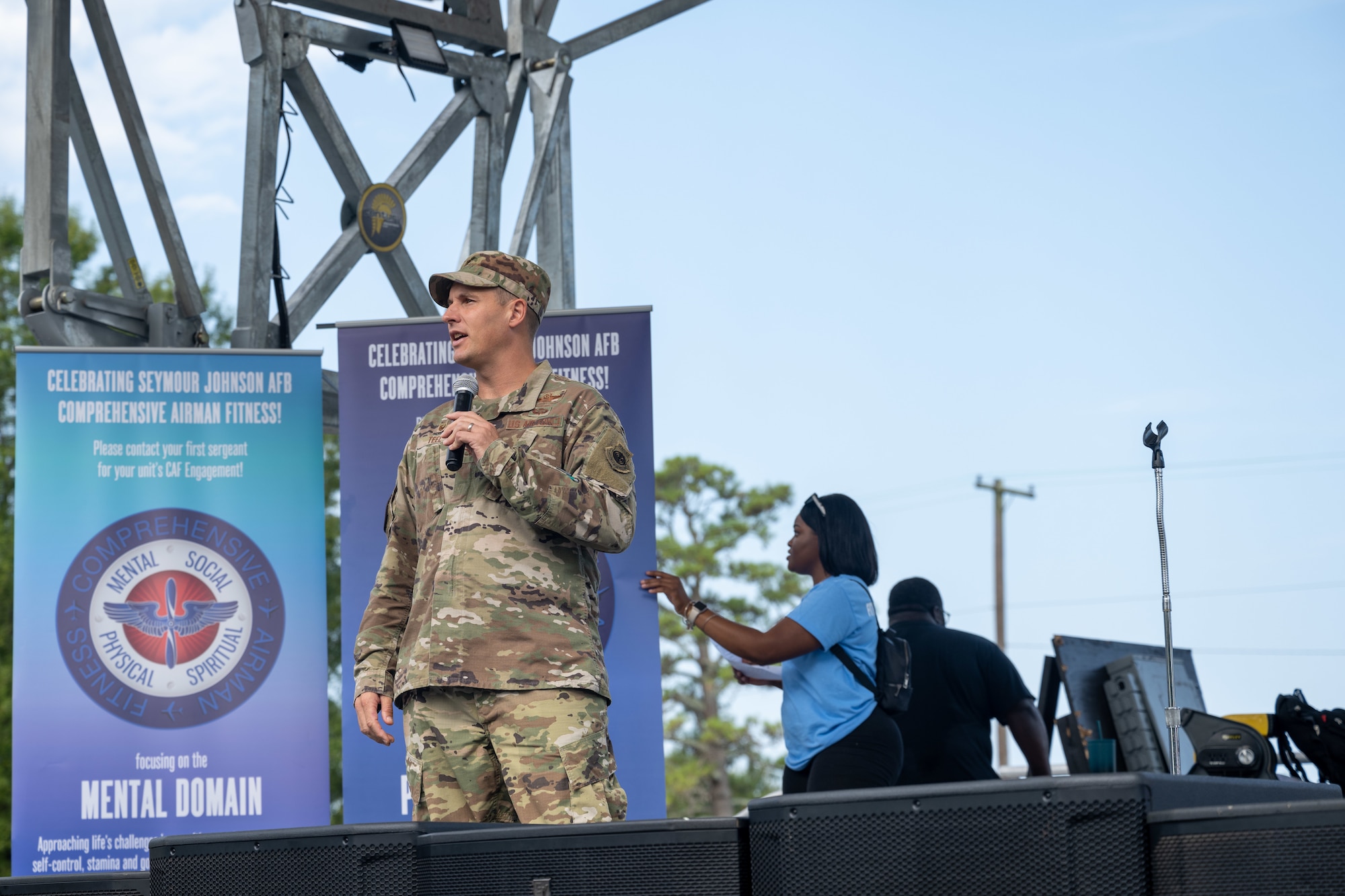 Col. Lucas J. Tell, commander of the 4th Fighter Wing, welcomes Airmen and their families to during an opening ceremony as part of a Comprehensive Airman Fitness day at Seymour Johnson Air Force Base, North Carolina, Aug. 25, 2023. CAF days allow Air Force personnel and Department of Defense civilians to strengthen resilience by focusing on developing mental, spiritual, physical and social fitness through training and sporting events. (U.S. Air Force photo by Staff Sgt. Koby I. Saunders)