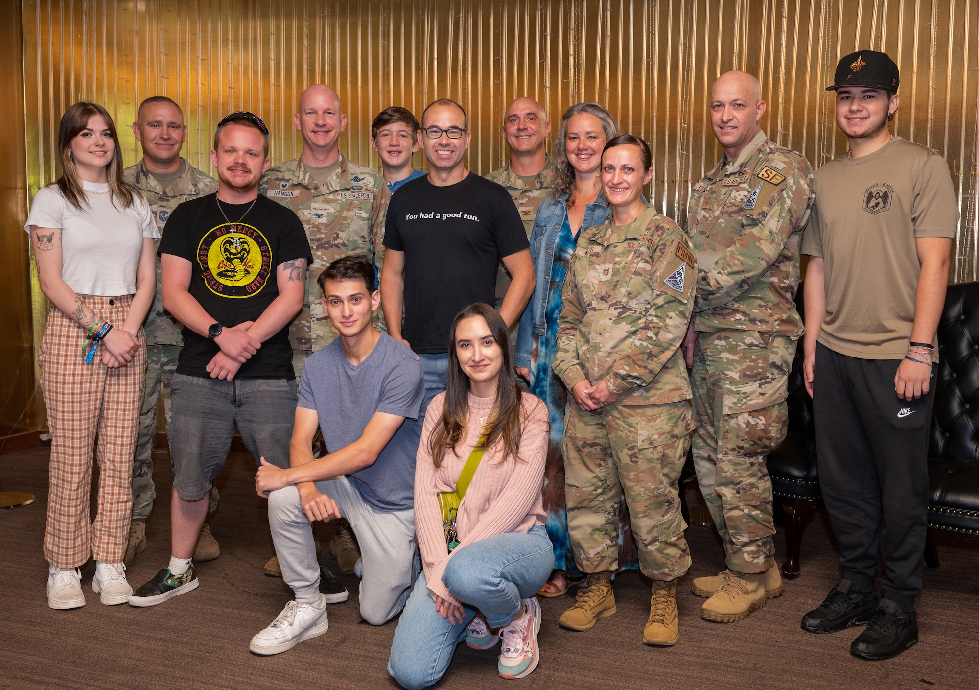 James Murray poses for a group photo with civilians and U.S. Air and Space Force leaders.