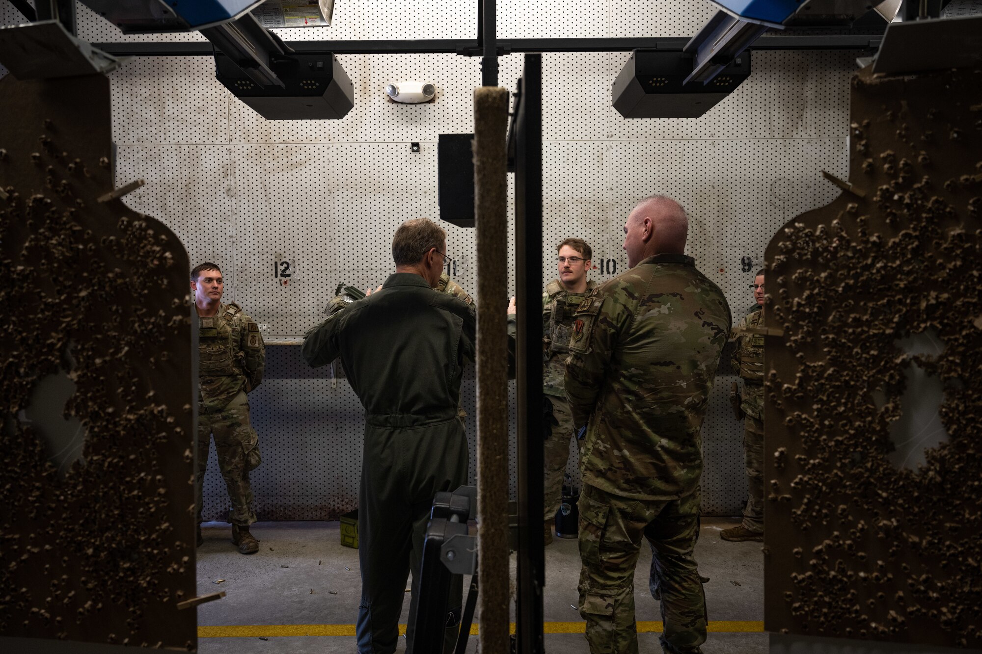 U.S. Air Force Lt. Gen. Russ L. Mack, the deputy commander of Air Combat Command, speaks to combat arms training and maintenance instructors and trainees during a base tour at Seymour Johnson Air Force Base, North Carolina, Aug. 24, 2023. Mack visited several locations on base  to discuss the 4th Fighter Wing mission, its components, and quality of life across the Wing while also recognizing several Airmen for their performance and dedication to the fighter wing mission. (U.S. Air Force photo by Staff Sgt. Koby I. Saunders)
