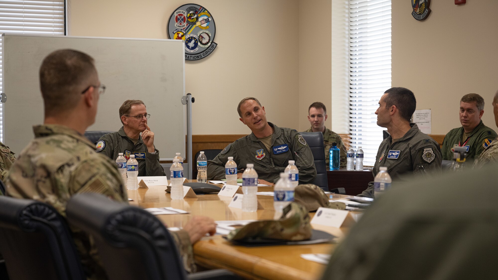 Commanders and senior leaders of the 4th Fighter Wing conduct a meeting with Lt. Gen. Russ L. Mack, the deputy commander of Air Combat Command, during a base tour at Seymour Johnson Air Force Base, North Carolina, Aug. 24, 2023. Mack visited several locations on base  to discuss the fighter wing mission, its components, and quality of life across the Wing while also recognizing several Airmen for their performance and dedication to the fighter wing mission. (U.S. Air Force photo by Staff Sgt. Koby I. Saunders)