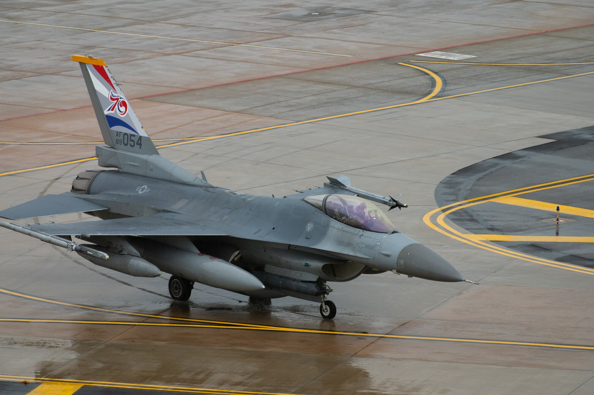 A U.S. Air Force F-16 Fighting Falcon assigned to the 80th Fighter Squadron taxis after landing at Kunsan Air Base.