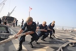 AGADIR, Morocco (Aug. 25, 2023) Sailors assigned to the Arleigh Burke-class guided-missile destroyer USS Paul Ignatius (DDG 117), handle lines while pulling into Morocco, Aug. 25, 2023. Paul Ignatius is on a scheduled deployment in the U.S. Naval Forces Europe area of operations, employed by the U.S. Sixth Fleet to defend U.S., allied and partner interests. (U.S. Navy photo by Mass Communication Specialist 1st Class Zac Shea)