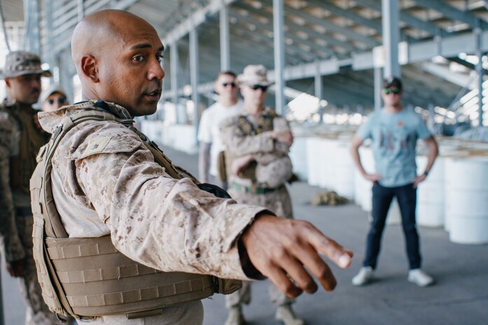 U.S. Marine Corps Maj. Alexander Mora, executive officer of Combat Logistics Battalion 15, 15th Marine Expeditionary Unit, briefs Marines on processing evacuees during a simulated military assisted departure as part of Realistic Urban Training exercise in Reno, Nevada, Aug. 24, 2023. During the scenario, the 15th MEU conducted a mission coordinating with a U.S. Consulate until the situation necessitated an evacuation of consulate staff and American citizens from the area. RUT is a land-based predeployment exercise which enhances the integration and collective capability of the Marine Air-Ground Task Force while providing the 15th MEU an opportunity to train and execute operations in an urban environment.