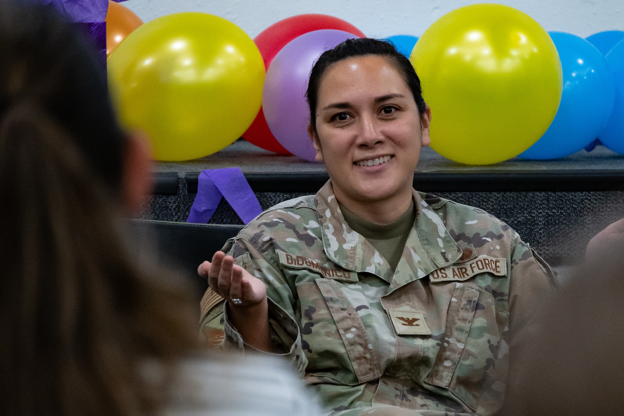 U.S. Air Force Col. Lauren DiDomenico interacts with an audience member.