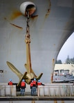 Sailors aboard USS Nimitz (CVN 68) complete work on the carrier's anchor during an availability in 2015 at Puget Sound Naval Shipyard & Intermediate Maintenance Facility in Bremerton, Washington. (U.S. Navy photo by Petty Officer 1st Class Jason Kofonow)