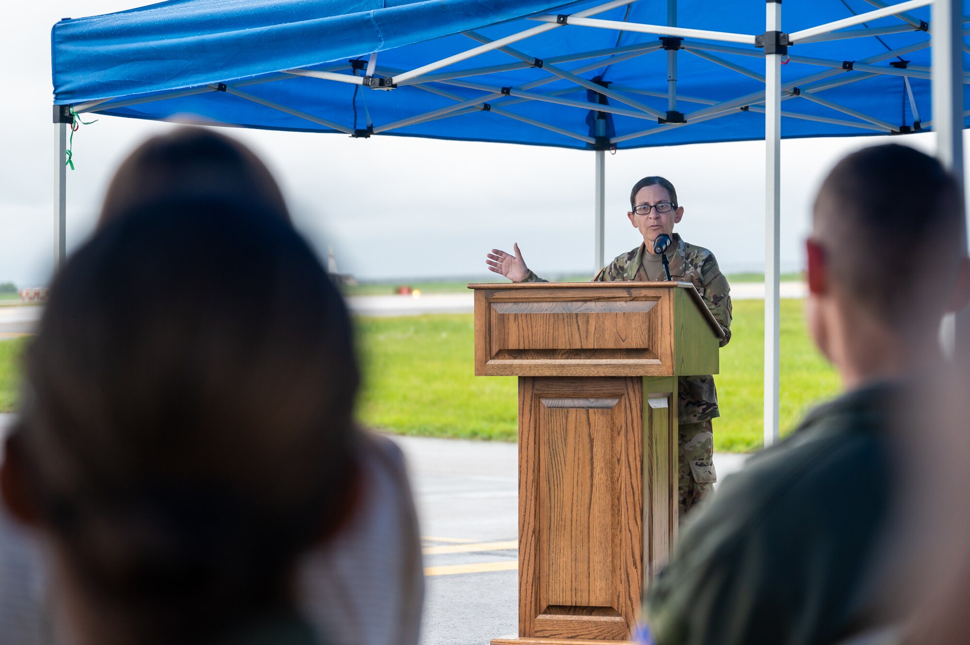 Col. Heather Levy addresses the crowd during a ribbon-cutting ceremony to reopen the runway.