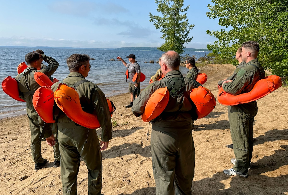Airmen from the 109th Airlift Wing participate in water survival and parachute refresher training on Great Sacandaga Lake in Mayfield, New York, Aug. 5-6, 2023. Airmen received flotation device and life raft familiarization training.