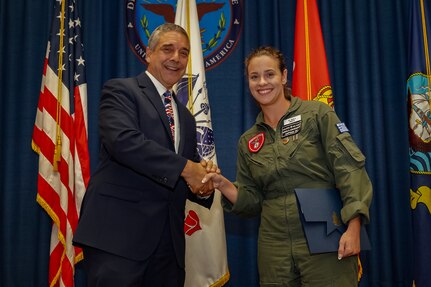 Hellenic Air Force nurse administers first-aid to maintenance worker