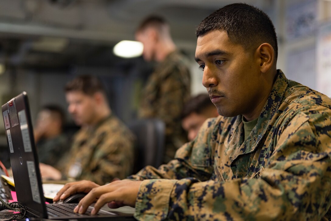 U.S. Marine Corps Sgt. Julian Martinmar, an administrative specialist with III Marine Expeditionary Force, enters data into a manning document in the Landing Force Operations Center aboard the USS Blue Ridge (LCC-19) in support of Ulchi Freedom Shield 23, August 28, 2023. Martinmar enlisted in the Marine Corps Reserves out of Asheville, North Carolina in February, 2015 after graduating from Pisgah high school in Canton, N.C. U.S. 7th Fleet’s flagship USS Blue Ridge is in port at Fleet Activities Yokosuka in Yokosuka, Japan. Ulchi Freedom Shield is a defense-oriented exercise designed to strengthen the ROK-U.S. Alliance, enhance our combined defense posture, and strengthen security and stability on the Korean peninsula. Martinmar is a native of Elizabeth, New Jersey. (U.S. Marine Corps photo by Cpl. Tyler Andrews)