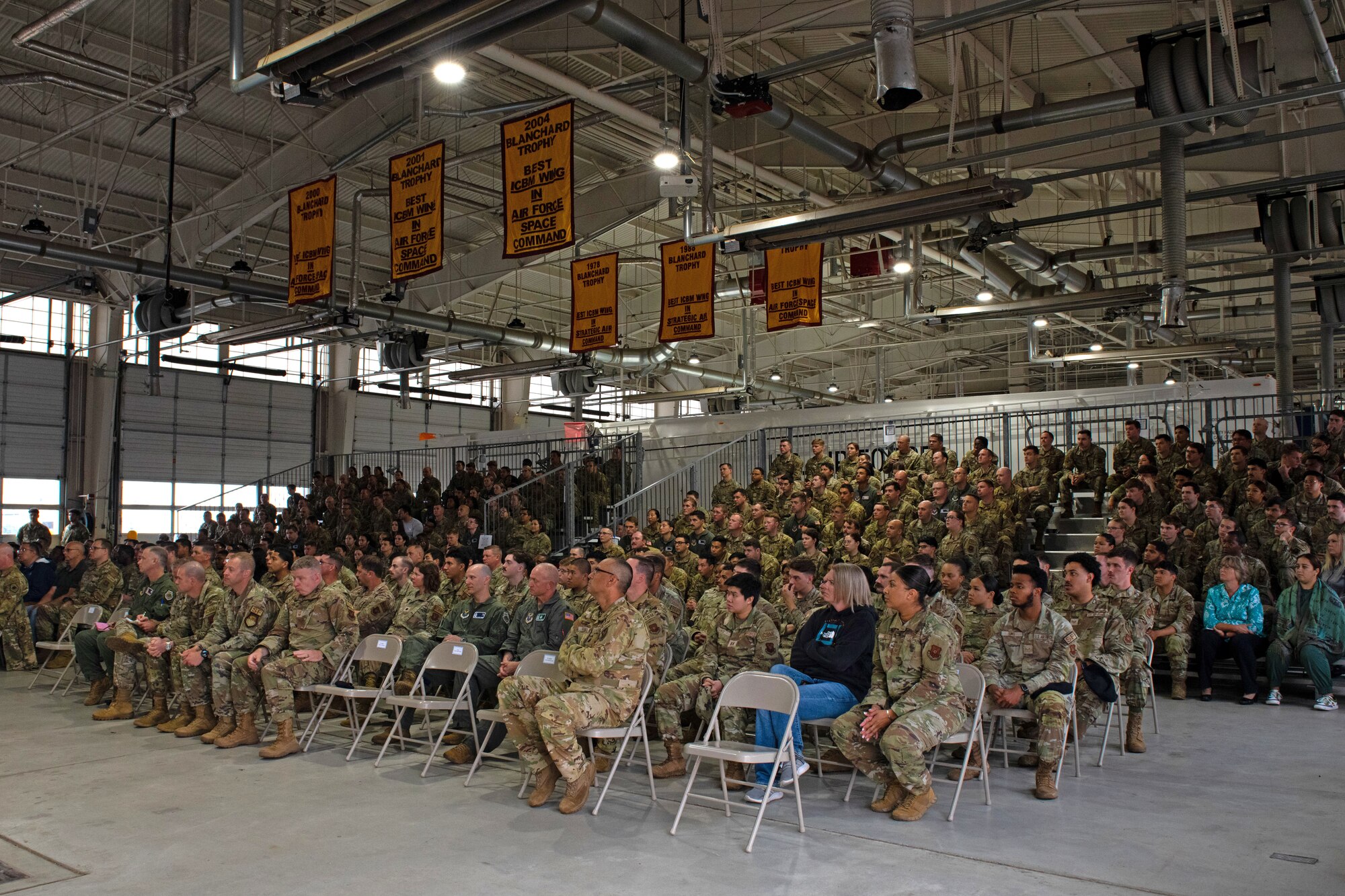 U.S. Air Force Col. Kenneth McGhee, 91st
Missile Wing commander, holds a
commander’s call at Minot Air Force Base,
North Dakota, Aug. 21, 2023. McGhee leads
more than 1,800 Air Force Airmen and
civilians in support of the Air Force Global
Strike Command’s land-based
Intercontinental Ballistic Missile mission.
(U.S. Air Force photo by Airman 1st Class
Alyssa Bankston)