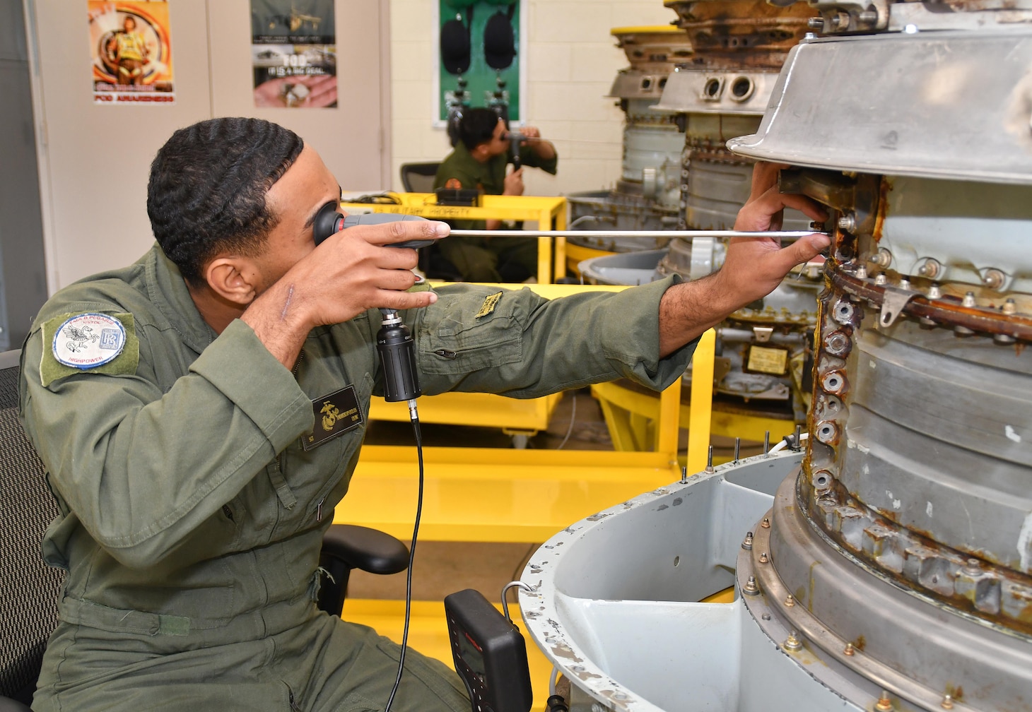 Marine Corps Sgt. Eric Andrekopoulos, assigned to Marine Attack Squadron (VMA) 223, participates in a practical exercise March 6 as part of the F402 Engine Tier 5 Remote Visual Inspection (RVI) Inspector Rating certification course at Fleet Readiness Center East.
