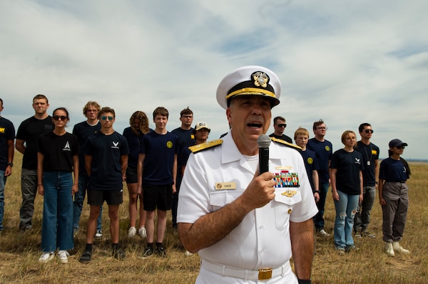 BILLINGS, Mont. (Aug. 12, 2023) Rear Adm. Matthew Case, commander, Naval Medical Forces Atlantic, gives remarks before an Oath of Enlistment Ceremony during the 2023 Yellowstone International Air Show at Billings-Logan International Airport.